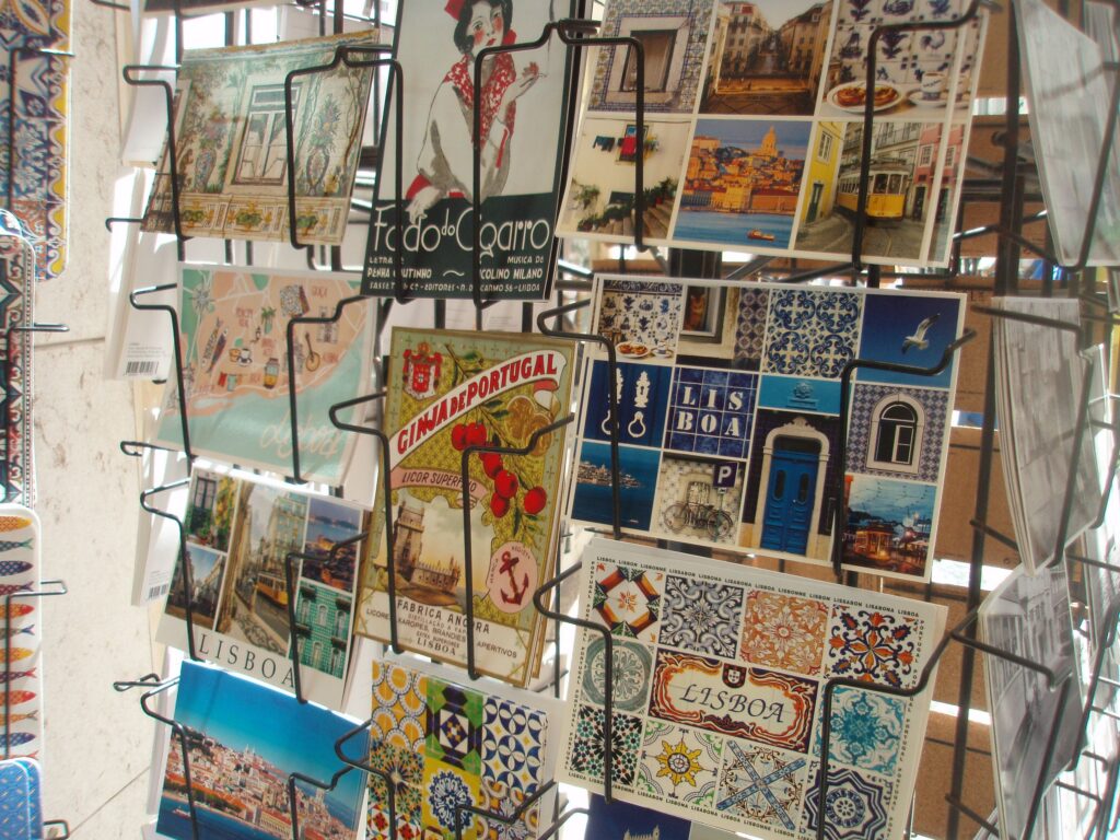 pexels-photo-23939197-23939197 Vibrant postcards display Lisbon's famous tiles and landmarks, capturing the city's essence.